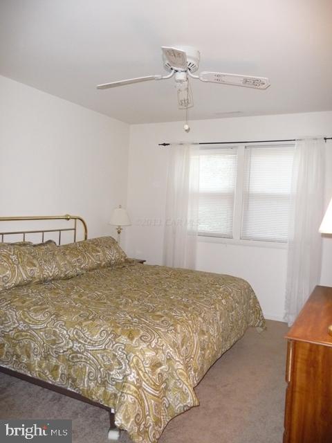 30 Beaconhill Road Ocean Pines, MD 21811 - Photo 6 of 12 a bedroom with a bed and with window