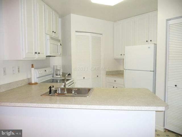 30 Beaconhill Road Ocean Pines, MD 21811 - Photo 9 of 12 a bathroom with a sink and a mirror