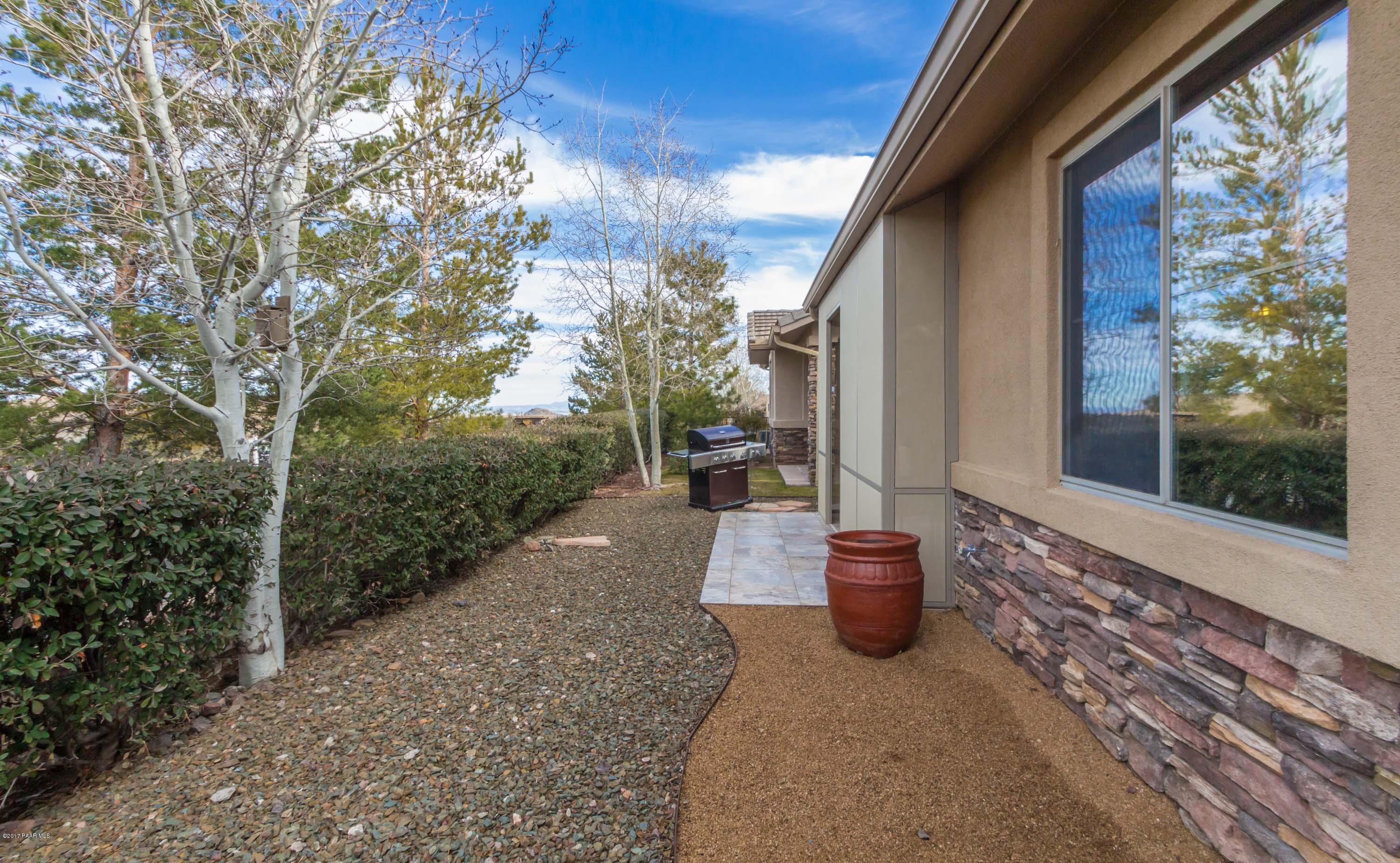 1256 Crown Ridge Drive Prescott, AZ 86301 - Photo 14 of 31 a view of a path along with trees