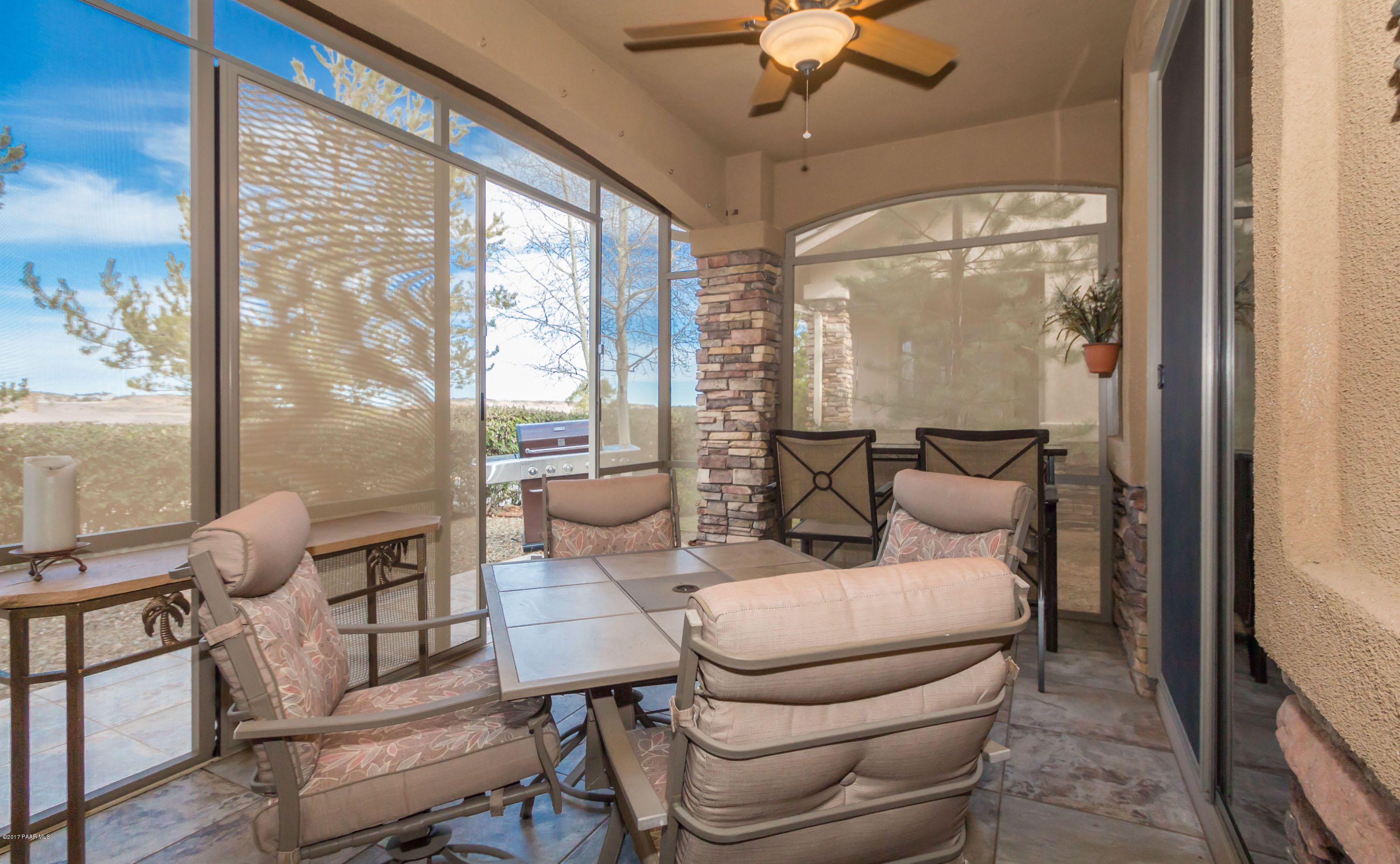 1256 Crown Ridge Drive Prescott, AZ 86301 - Photo 15 of 31 a living room with furniture and a large window