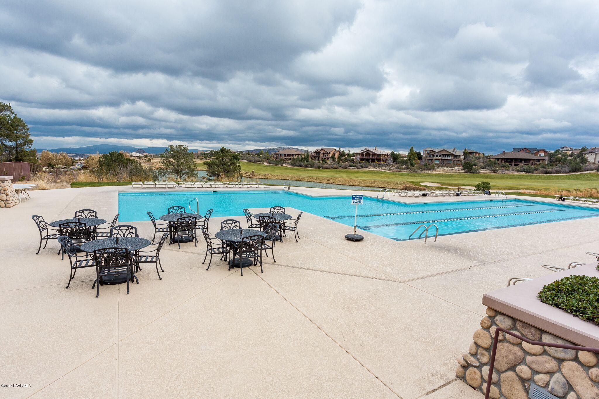 1256 Crown Ridge Drive Prescott, AZ 86301 - Photo 22 of 31 an outdoor space with furniture and ocean view