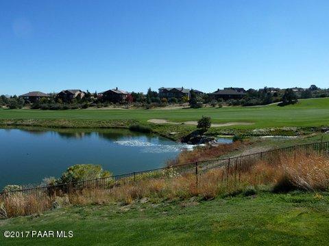 1256 Crown Ridge Drive Prescott, AZ 86301 - Photo 28 of 31 a view of a lake with a city view