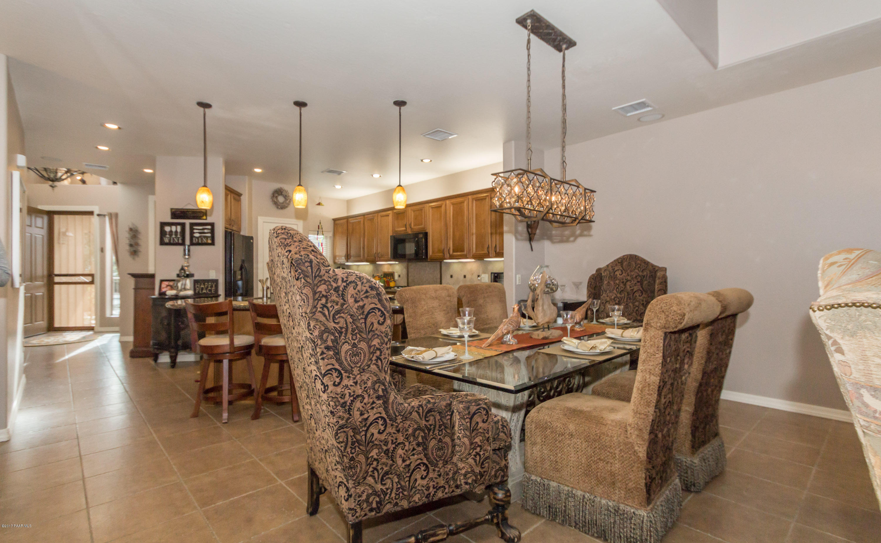 1256 Crown Ridge Drive Prescott, AZ 86301 - Photo 8 of 31 a view of a dining room with furniture