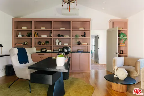 a view of a chairs and tables in the patio