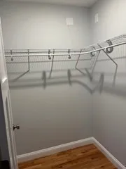 a view of a room with racks on the wall