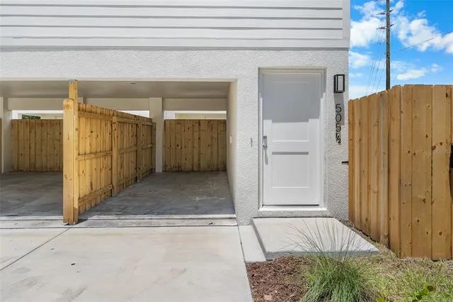 a view of a back yard of the house
