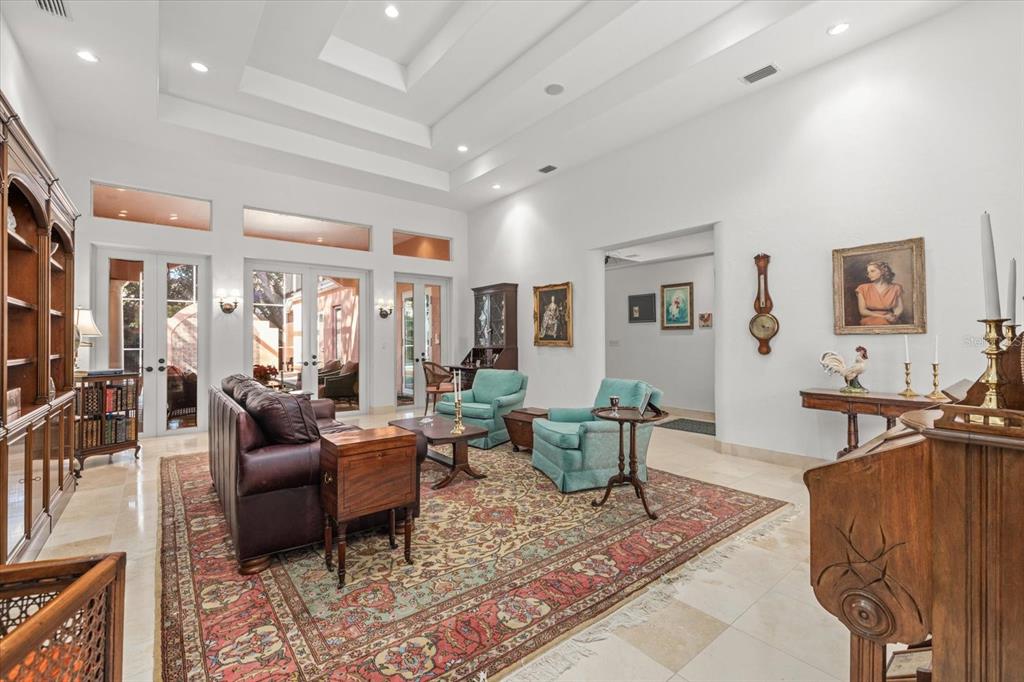 4939 Peregrine Point Way Sarasota, FL 34231 - Photo 11 of 57 a living room with furniture and a couch