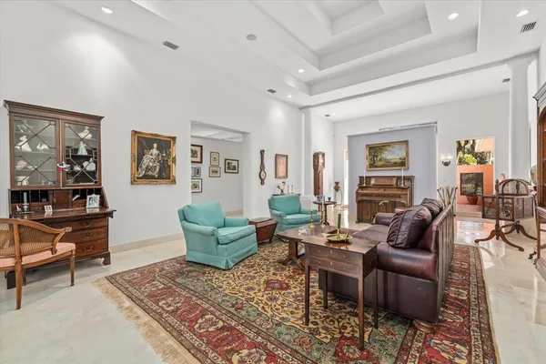a living room with furniture and a window