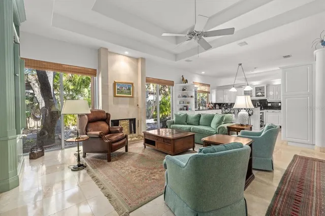 a kitchen with stainless steel appliances granite countertop a refrigerator a stove and a refrigerator