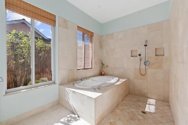 a bathroom with a double vanity sink mirror and