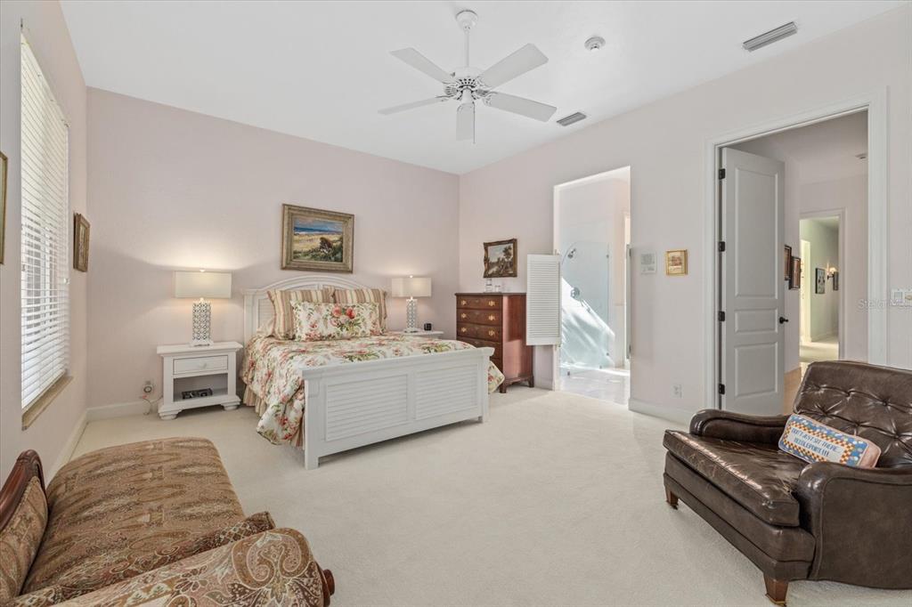 4939 Peregrine Point Way Sarasota, FL 34231 - Photo 36 of 57 a living room with furniture and a couch
