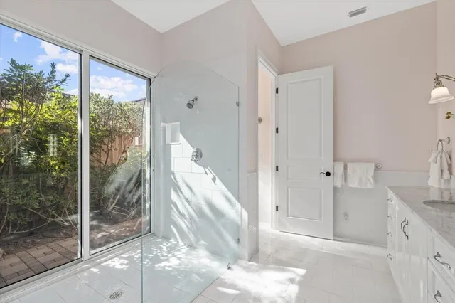 a patio with patio couch and chairs