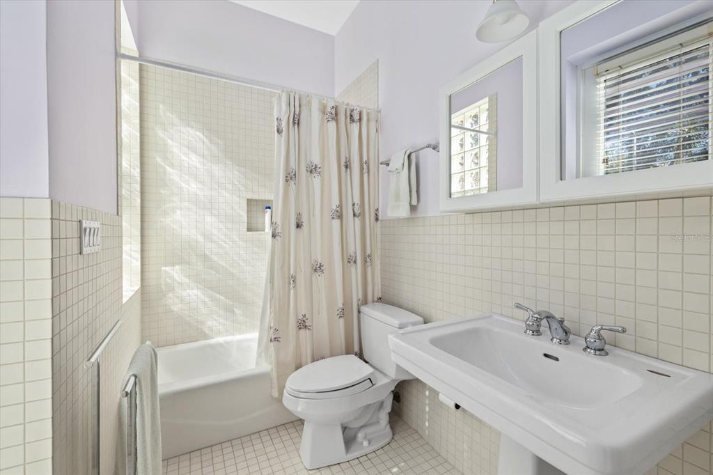 4939 Peregrine Point Way Sarasota, FL 34231 - Photo 41 of 57 a bathroom with a sink toilet and shower