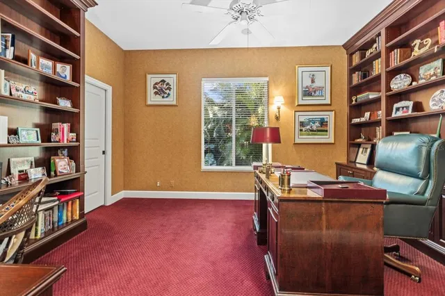 a view of a living room with a swimming pool