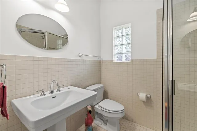 a view of a swimming pool with a lounge chair