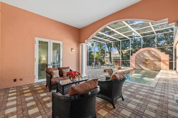 a view of a swimming pool with a lounge chair