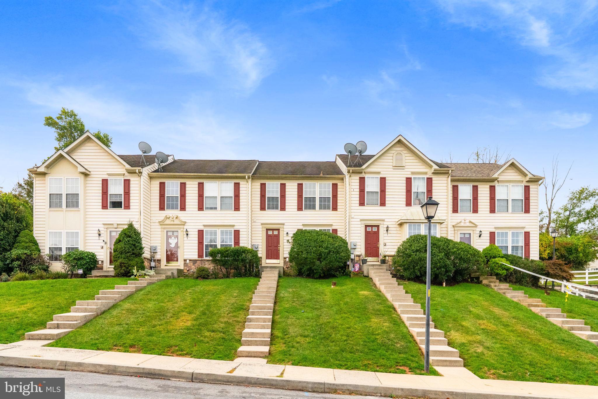 1703 Orchard View Road Reading, PA 19606 - Photo 2 of 53 a front view of a house with a yard