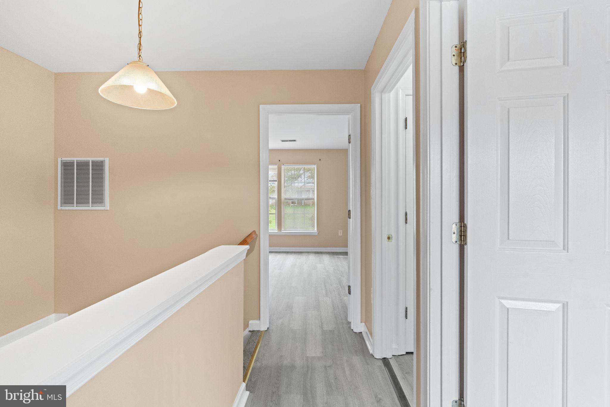 1703 Orchard View Road Reading, PA 19606 - Photo 25 of 53 a view of hallway with wooden floor