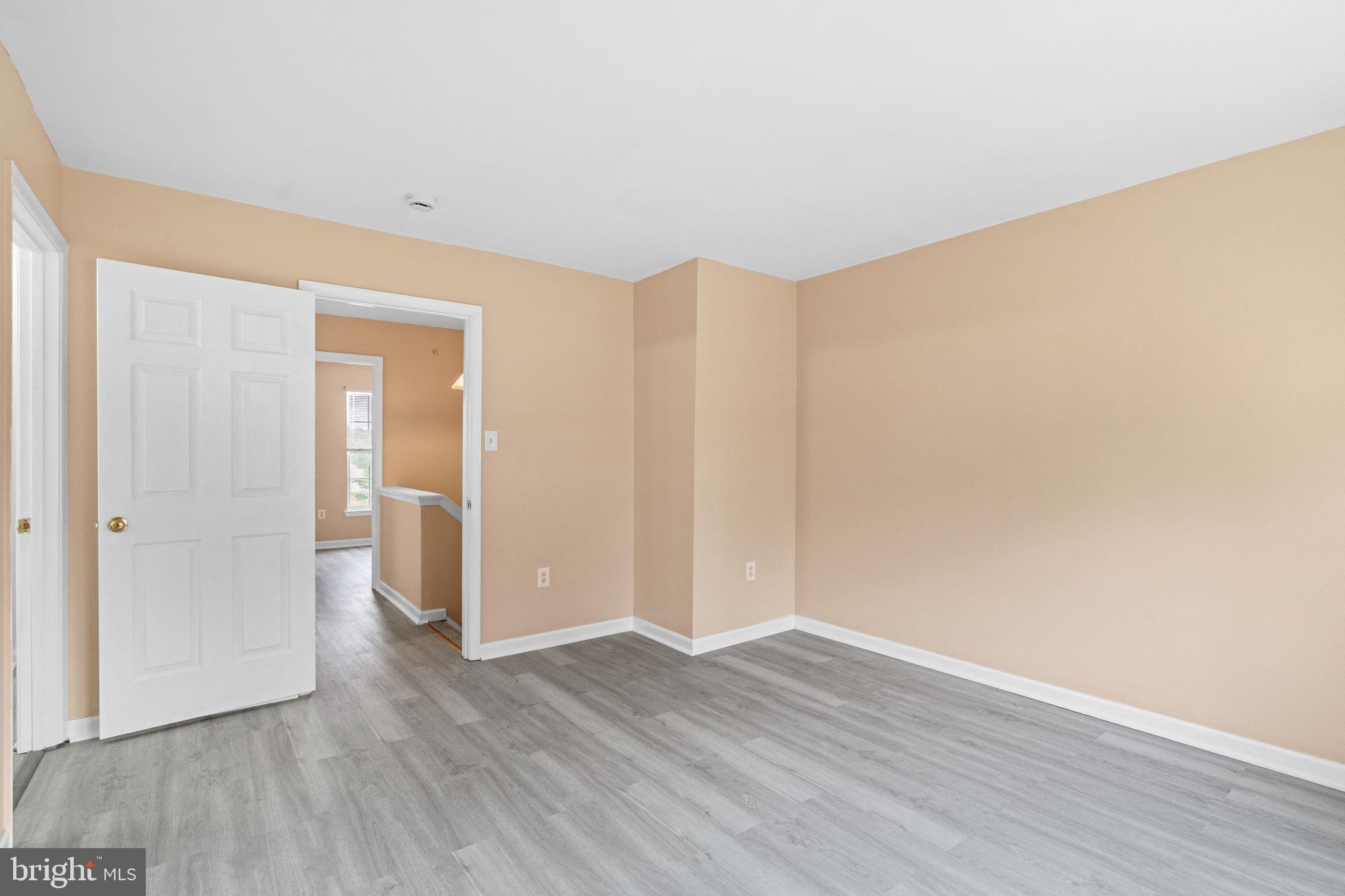 1703 Orchard View Road Reading, PA 19606 - Photo 31 of 53 a view of an empty room and wooden floor