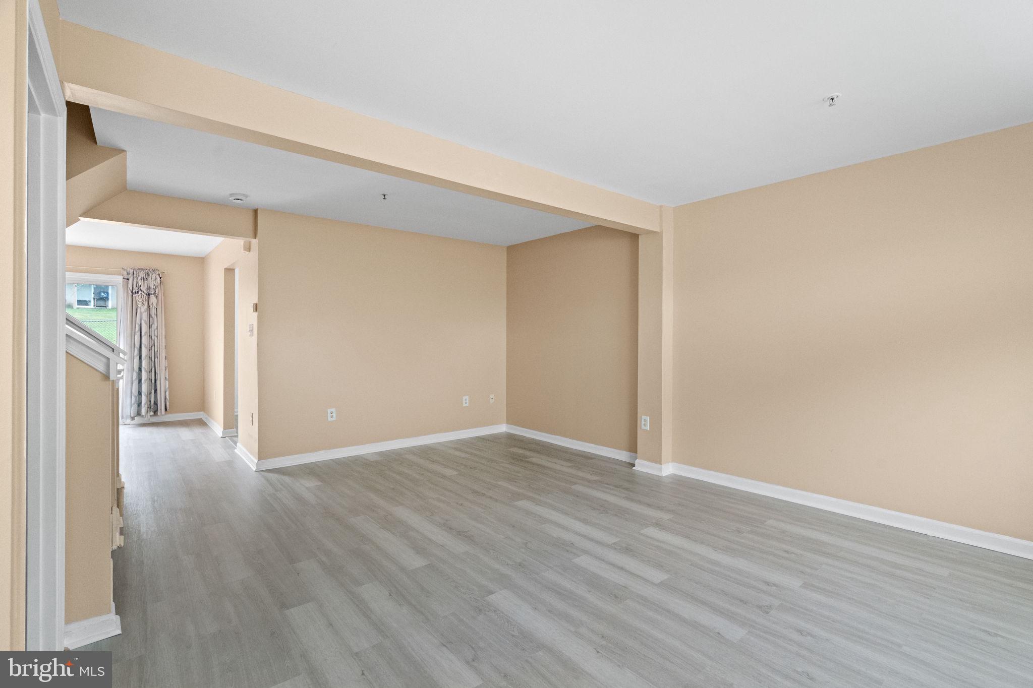 1703 Orchard View Road Reading, PA 19606 - Photo 5 of 53 a view of an empty room with wooden floor