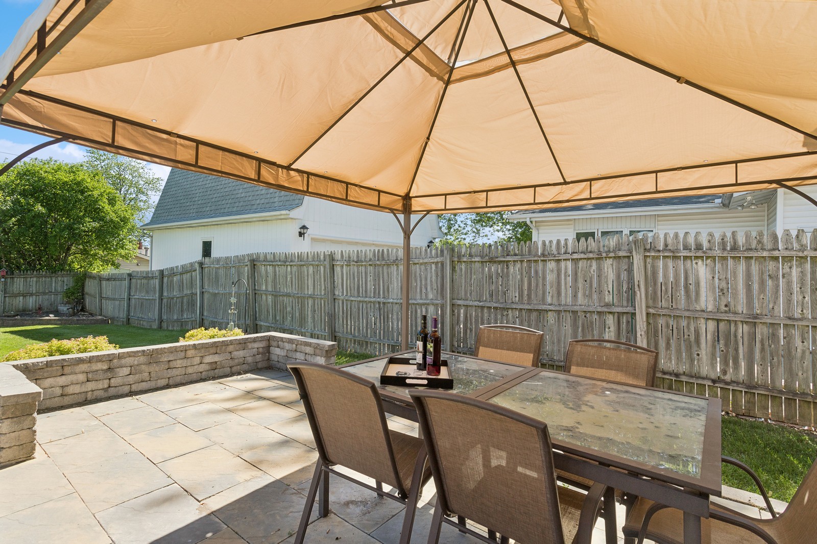 1201 Basin Drive Lockport, IL 60441 - Photo 13 of 16 a backyard of a house with table and chairs