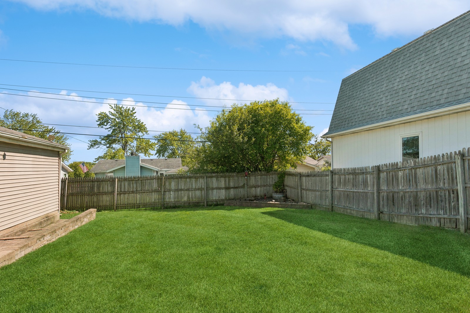 1201 Basin Drive Lockport, IL 60441 - Photo 16 of 16 a view of a yard with a fence