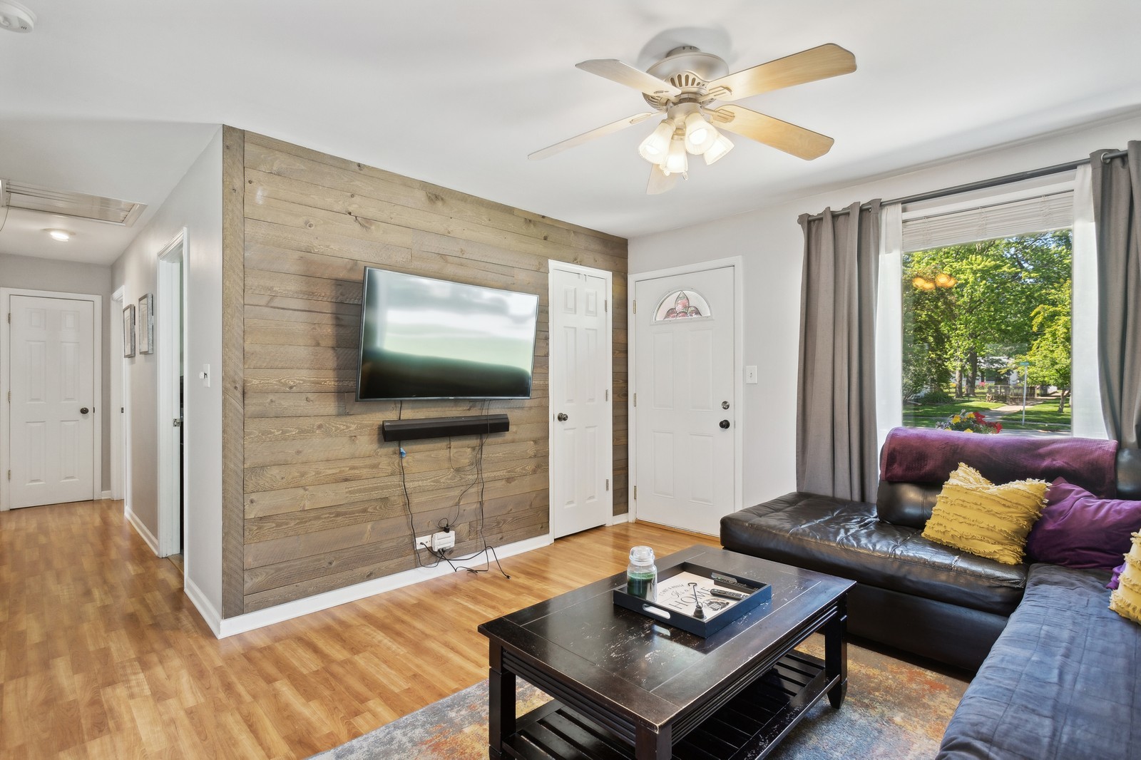1201 Basin Drive Lockport, IL 60441 - Photo 4 of 16 a living room with furniture and a flat screen tv