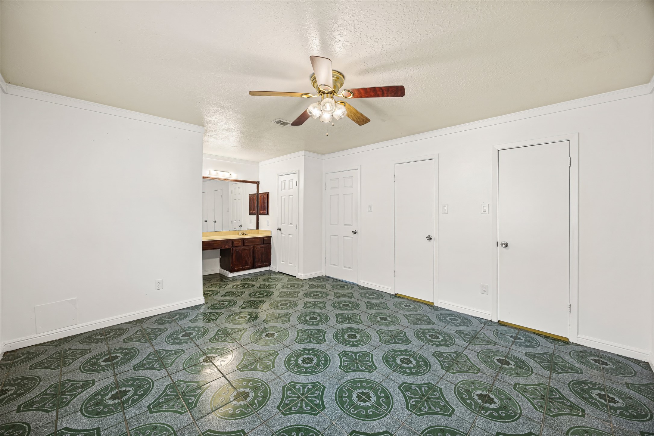 7226 Ridgeberry Drive Houston, TX 77095 - Photo 16 of 31 a bedroom with a bed and a chandelier