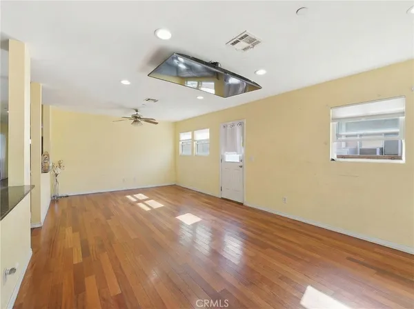 a view of an empty room and window