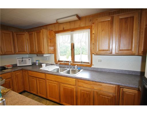47 Ross Hill Road Charlestown, RI 02813 - Photo 3 of 5 Kitchen. This kitchen is not original to the house. It also "sports" a sit up bar at the center island!
