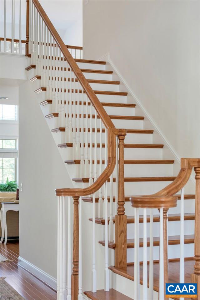 2633 South Bennington Road Charlottesville, VA 22901 - Photo 3 of 13 a view of entryway with wooden floor and stairs