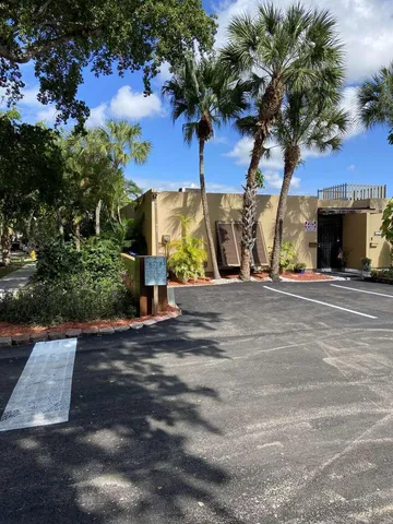 a view of street with parked cars