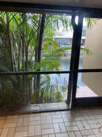 a bedroom with a bed and dresser