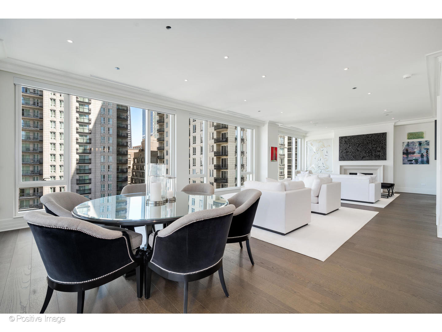 9 West Walton Street, Unit 1501 Chicago, IL 60610 - Photo 17 of 37 a dining room with furniture and wooden floor