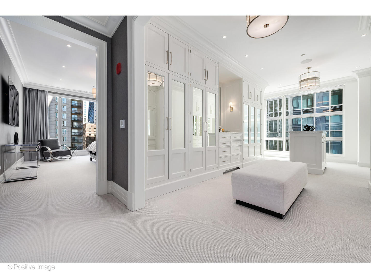 9 West Walton Street, Unit 1501 Chicago, IL 60610 - Photo 23 of 37 a living room with furniture and large windows