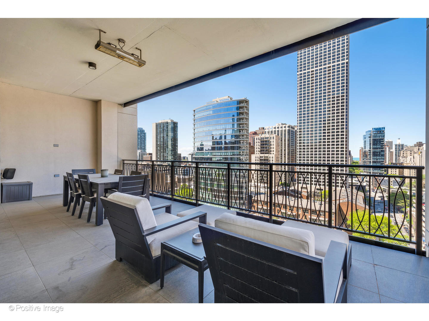 9 West Walton Street, Unit 1501 Chicago, IL 60610 - Photo 33 of 37 a view of a dining room with furniture window and outside view