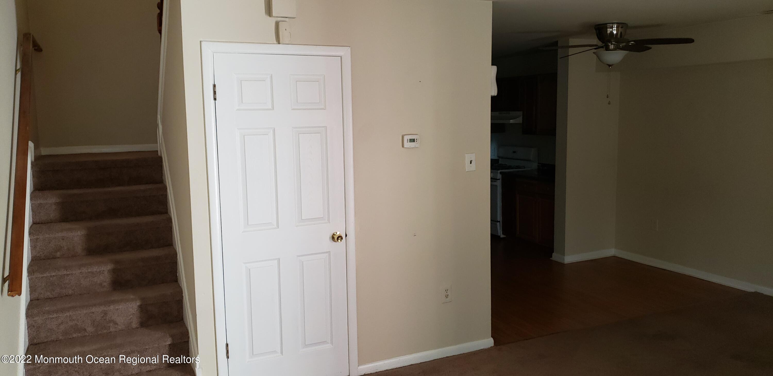 31 Pin Oak Lane Little Egg Harbor, NJ 08087 - Photo 5 of 10 Stairs,closet,kitchen to right.
