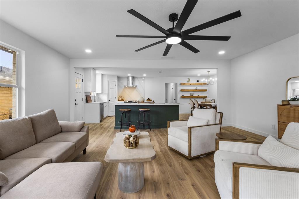 1917 South Vernon Avenue Dallas, TX 75224 - Photo 4 of 28 Open-concept living area featuring wood-finish flooring, recessed lighting, and a contemporary ceiling fan