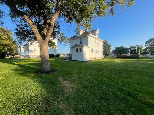 a house with garden in front of it