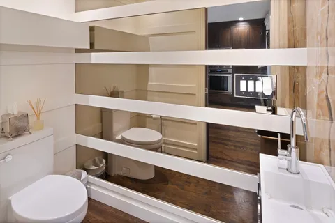 a bathroom with a toilet and a sink