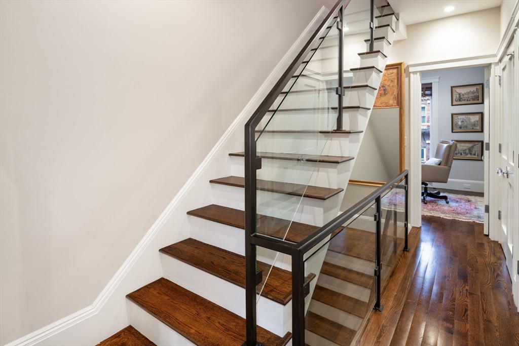 109 Appleton Street Boston, MA 02116 - Photo 19 of 30 a view of entryway with wooden floor and stairs