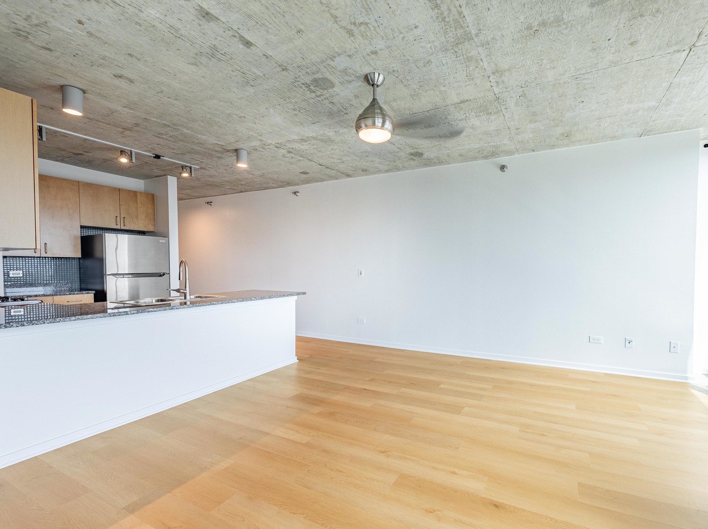 611 South Wells Street, Unit 2301 Chicago, IL 60607 - Photo 12 of 25 a view of kitchen and empty room