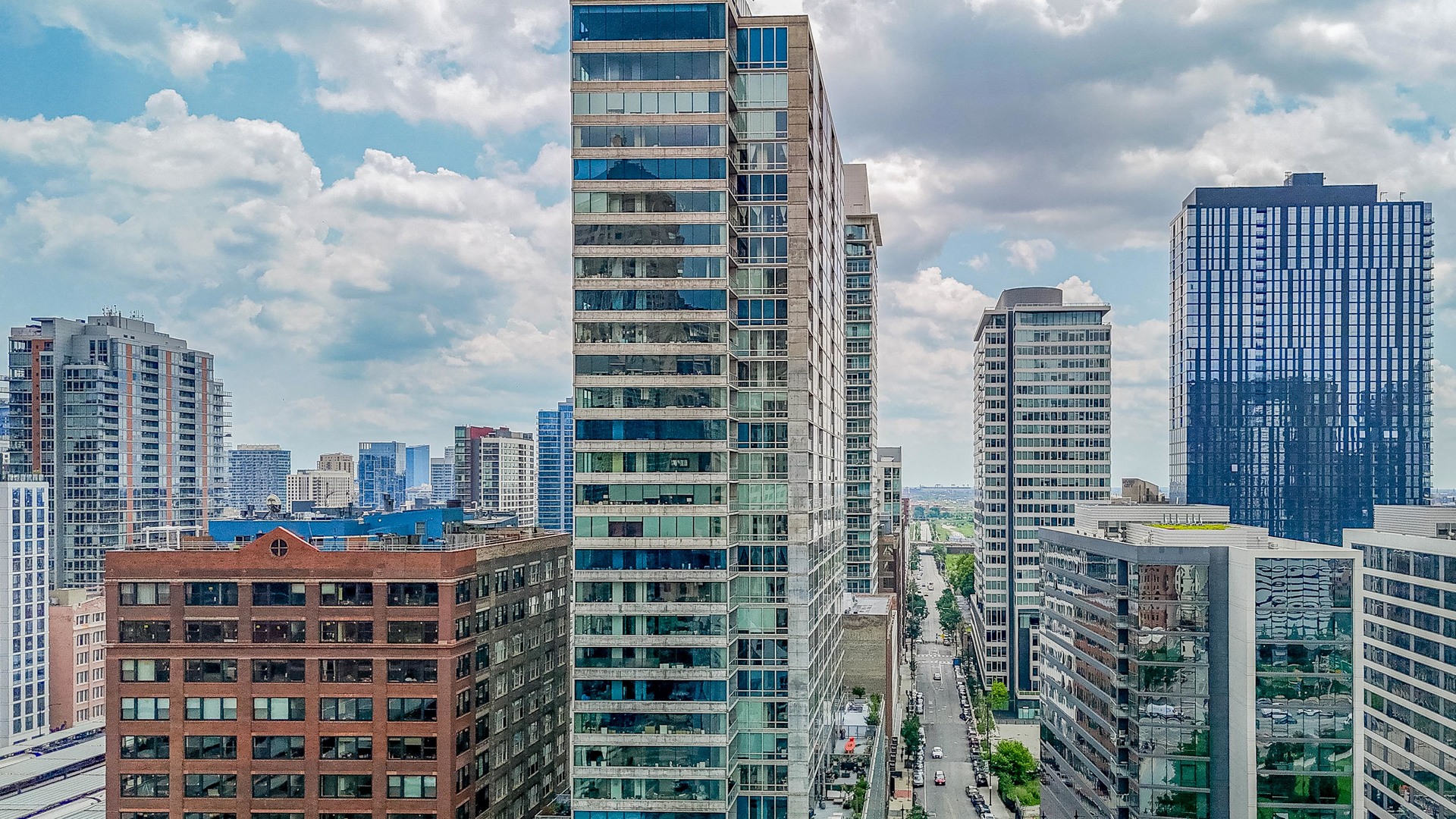 611 South Wells Street, Unit 2301 Chicago, IL 60607 - Photo 2 of 25 a view of a city with tall buildings