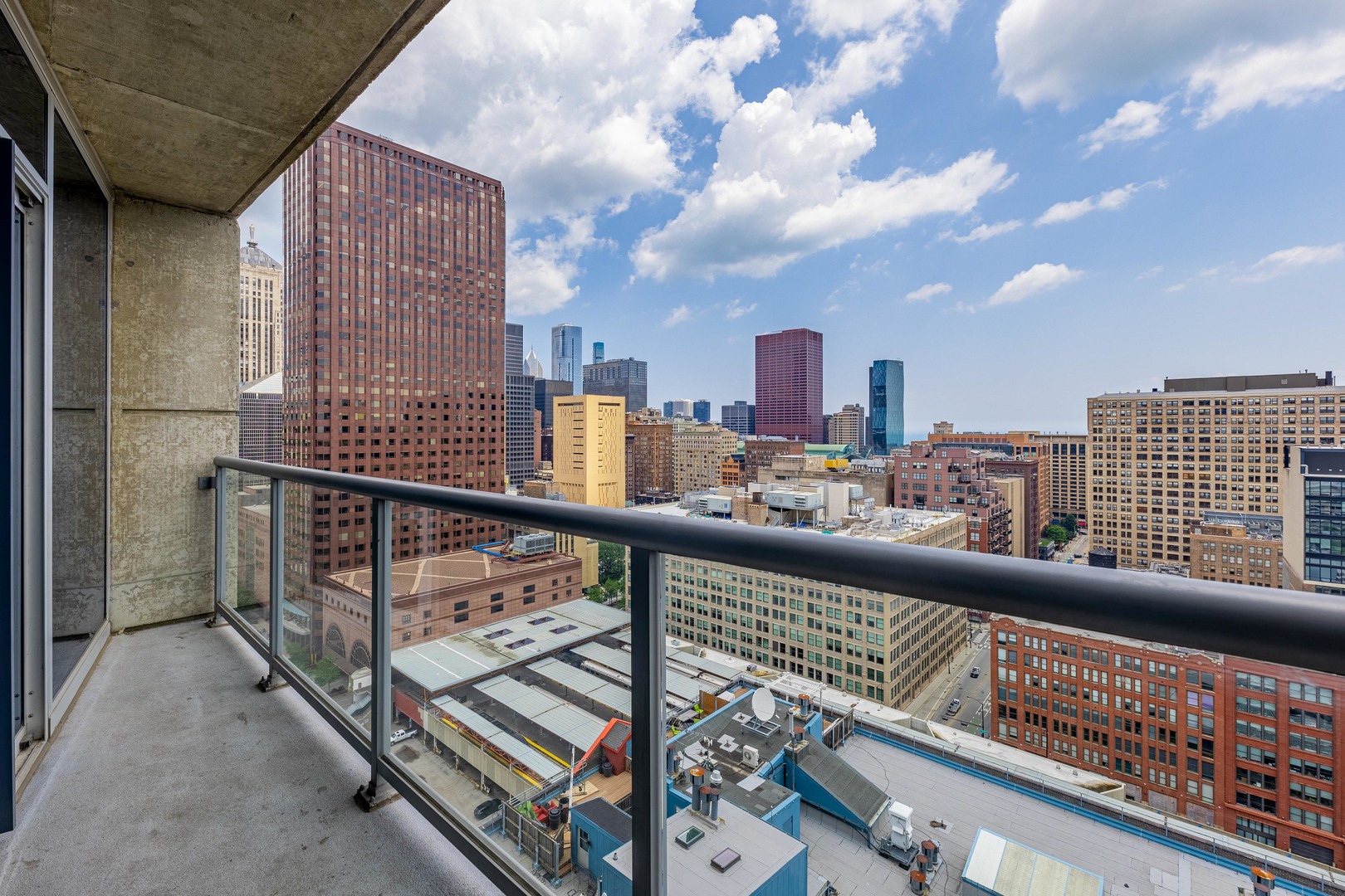 611 South Wells Street, Unit 2301 Chicago, IL 60607 - Photo 25 of 25 a view of city from a balcony
