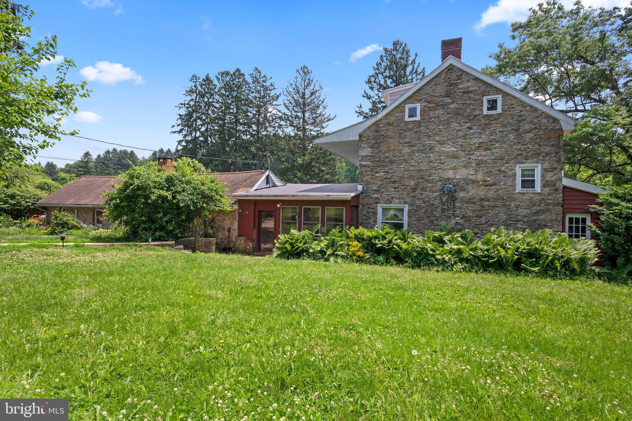 564 Blandon Road Fleetwood, PA 19522 - Photo 1 of 45 a front view of a house with a yard