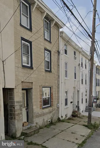 a front view of a building with street