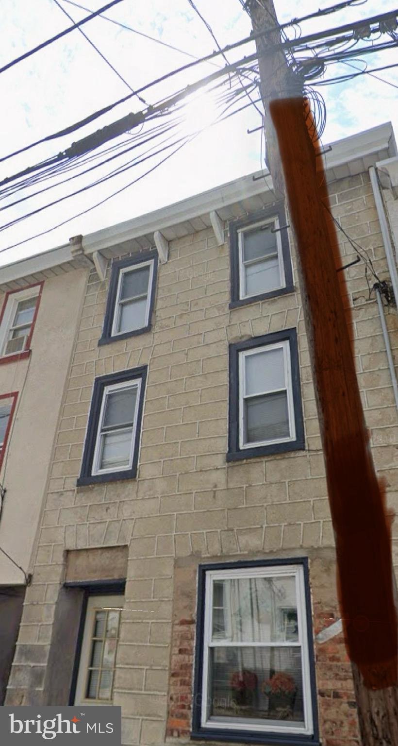 139 East Street Philadelphia, PA 19127 - Photo 5 of 6 a front view of a building with windows