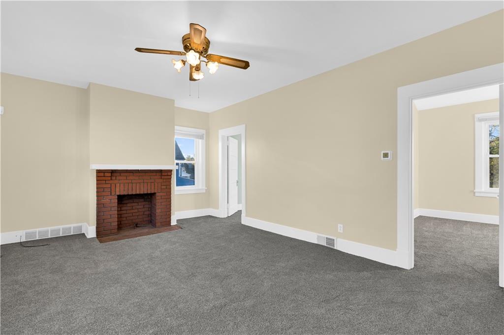 2071-2073 Brodhead Road Aliquippa, PA 15001 - Photo 13 of 34 a view of an empty room with window and fireplace