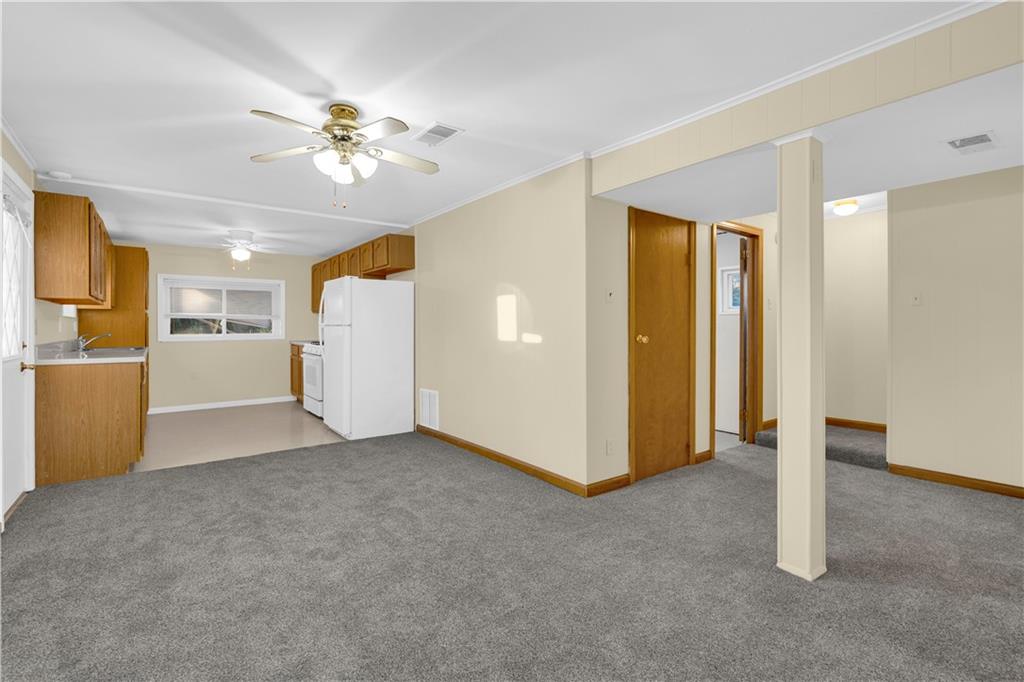 2071-2073 Brodhead Road Aliquippa, PA 15001 - Photo 29 of 34 a view of a livingroom with a chandelier