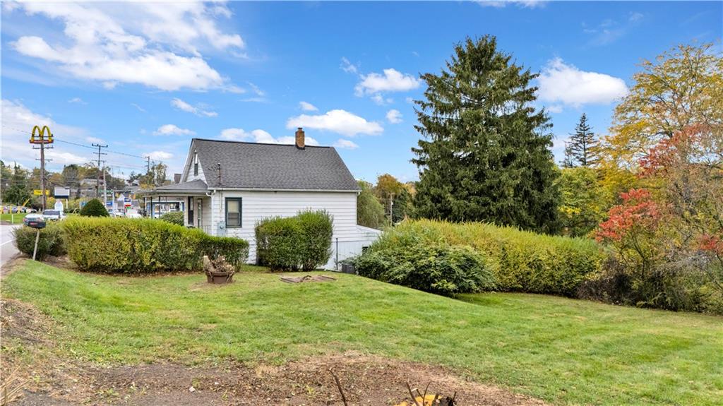 2071-2073 Brodhead Road Aliquippa, PA 15001 - Photo 6 of 34 a view of a house with a yard